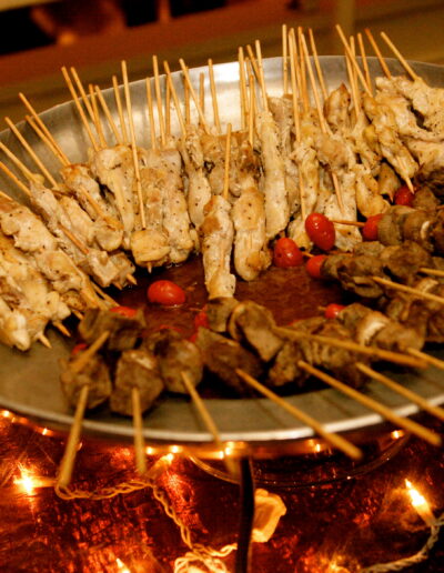 Platter of grilled chicken and mixed appetizer skewers